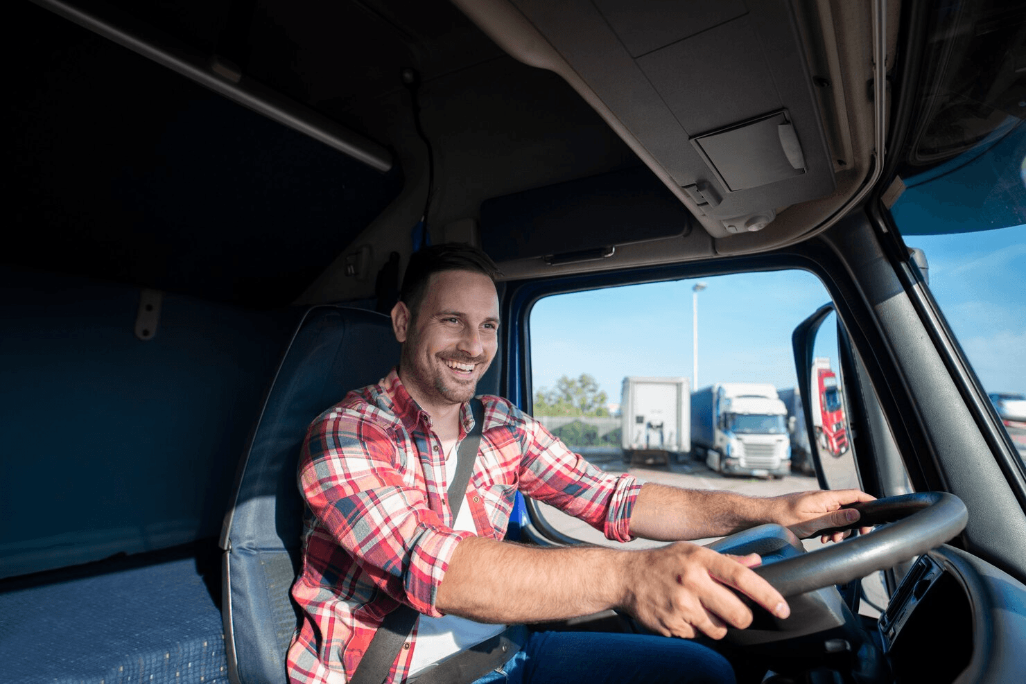 Logistics professional in a truck cabin